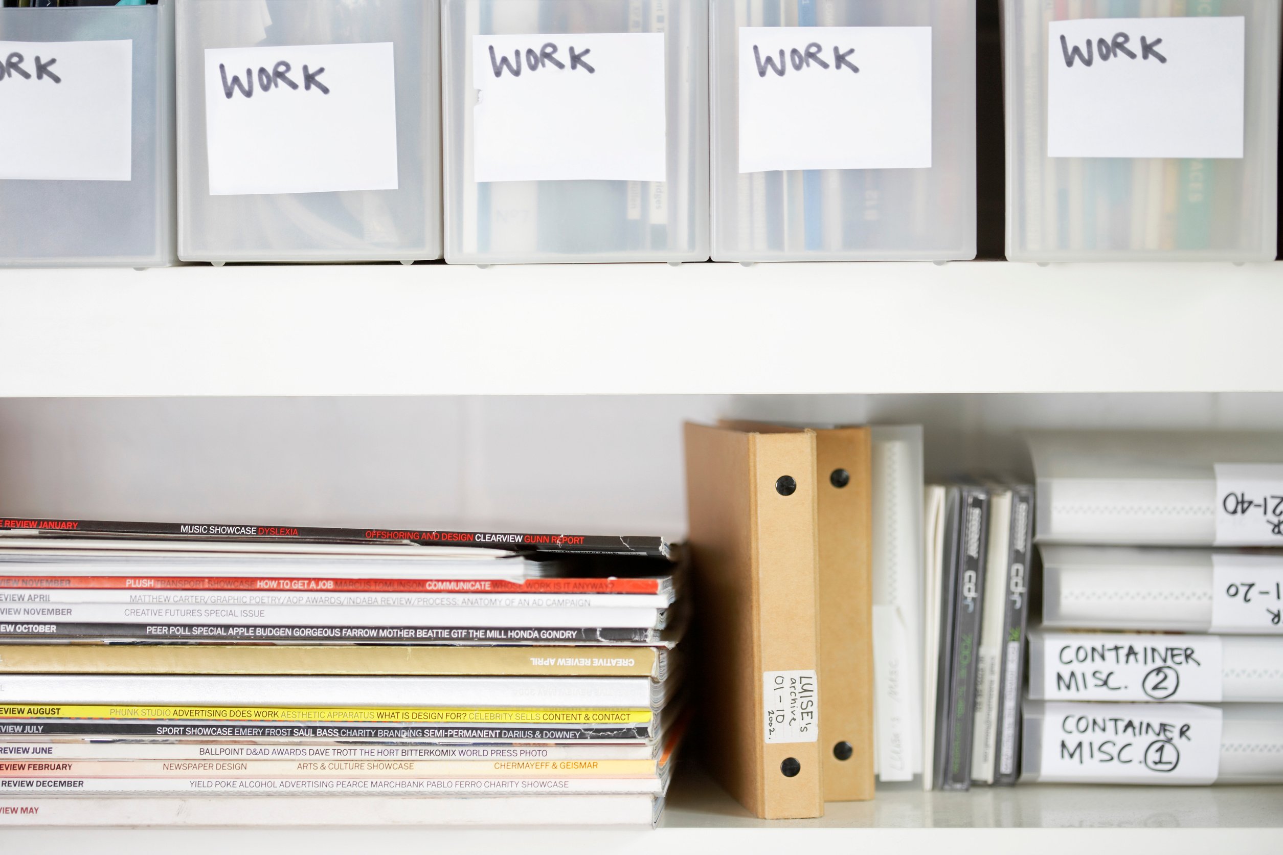 Magazines and folders in organized shelves